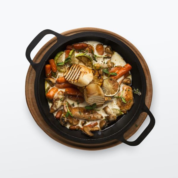 chicken and vegetables stewed in pot isolated on w PXNY5KR