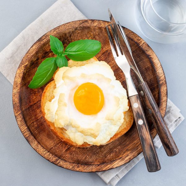 trendy cloud or fluffy egg dish on wooden plate to TFBWUKH